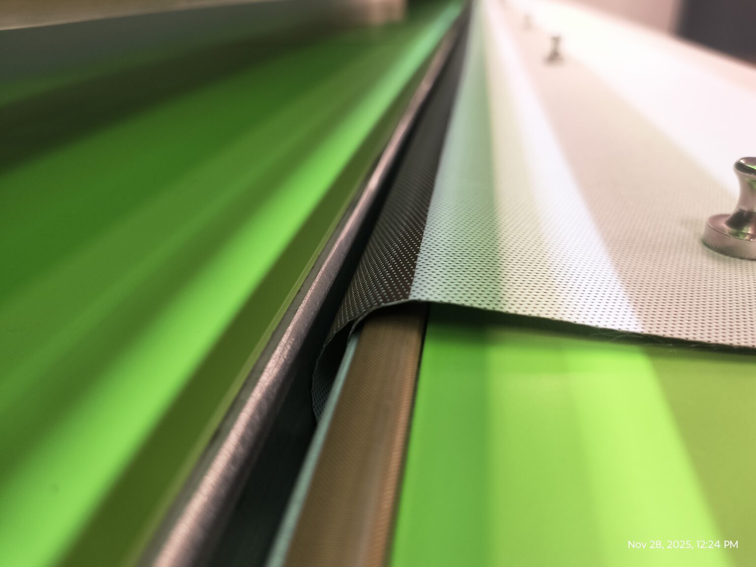 Heat welding machine used to create hem pockets for roller shade fabric replacement in NYC