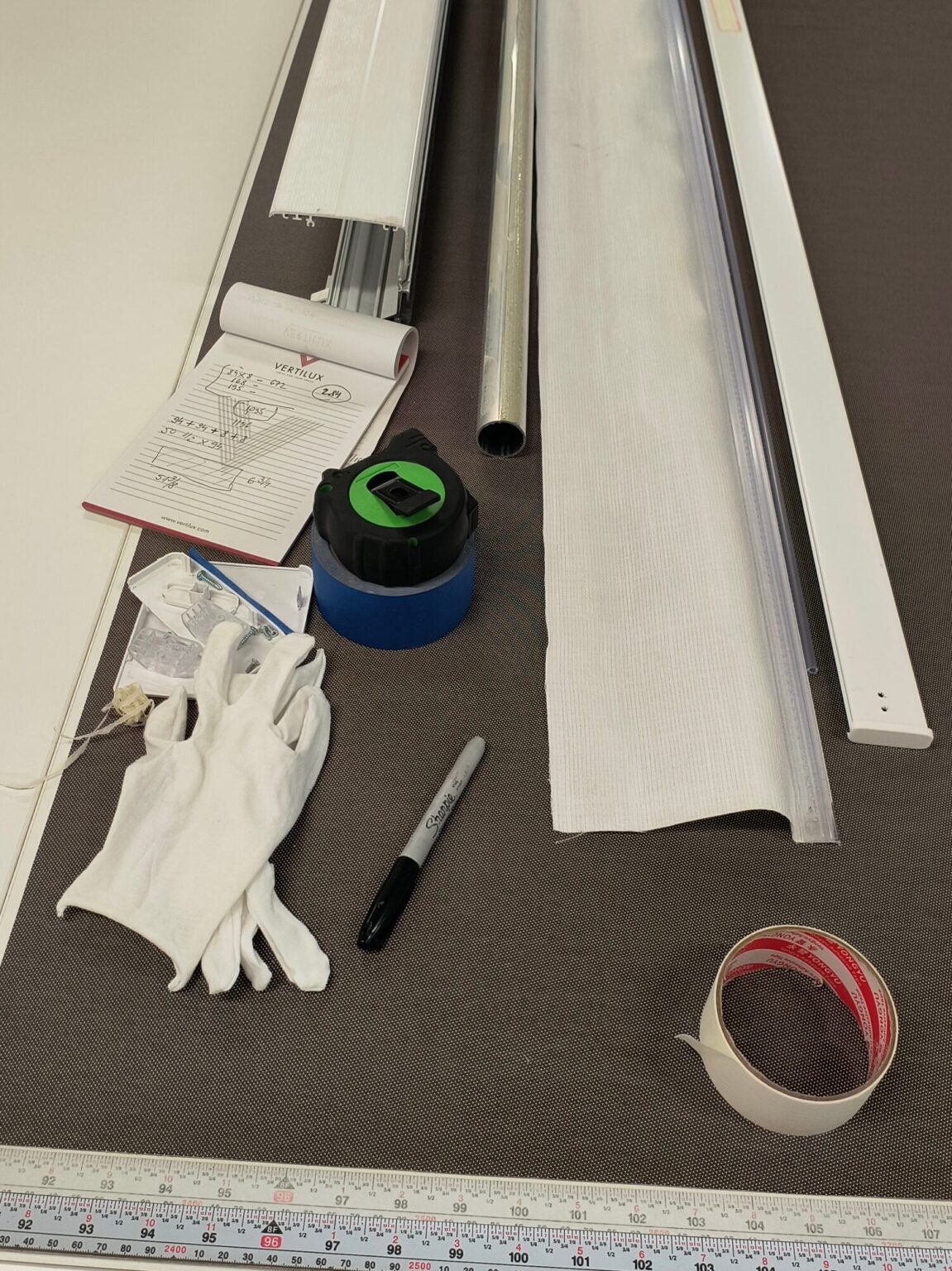 Roller shade fabric measurement tools and workshop setup in NYC