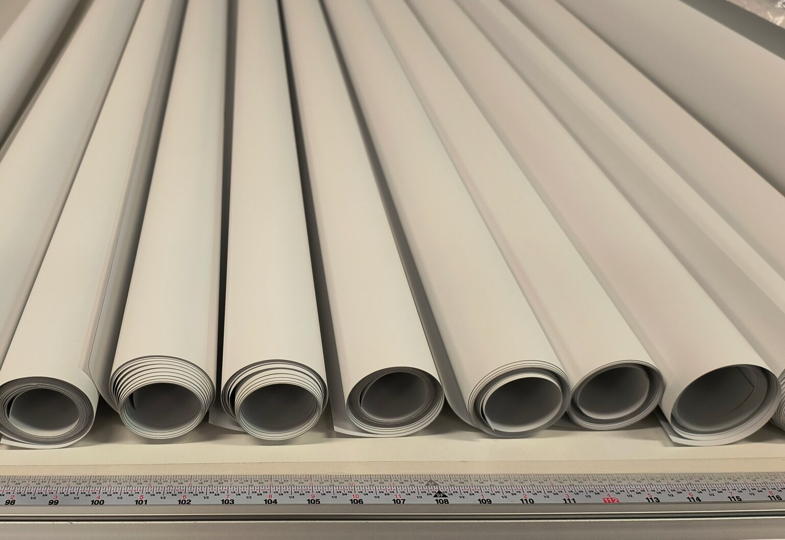 Custom roller shade fabric rolls measured and cut for local replacement service