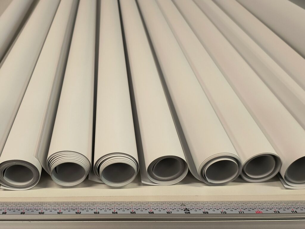 Custom roller shade fabric rolls measured and cut for local replacement service